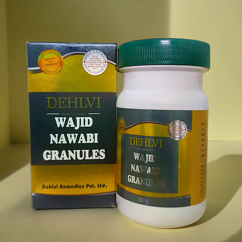 Dehlvi Wajid Nawabi Ayurvedic Granules in a glass jar, showing the herbal supplement's packaging and granules inside.