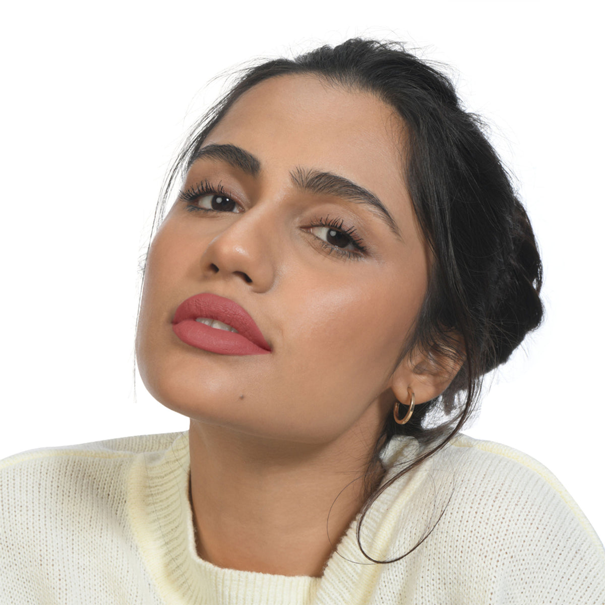KIRO Lush Moist Matte Lipstick in Nude Rose, showing the smooth, creamy lipstick bullet in a warm pink shade.