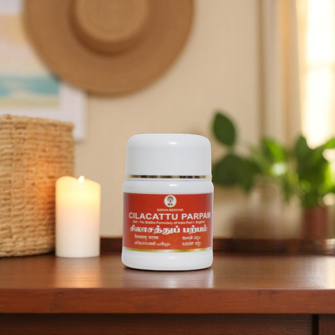 Impcops Silasath Parpam Ayurvedic medicinal powder in a traditional jar, used for natural health remedies.