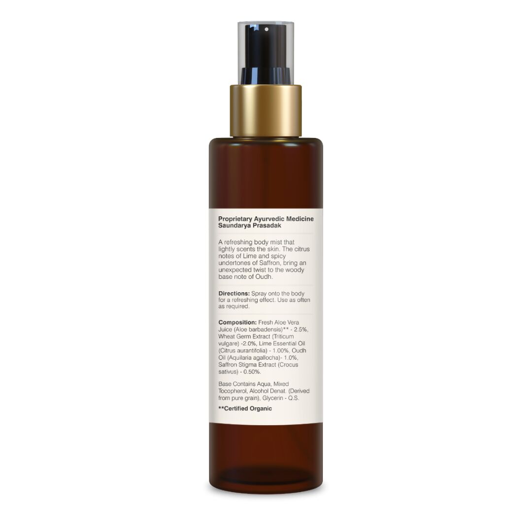 Forest Essentials Lime Saffron & Oudh scented body mist bottle with botanical design and fresh, citrusy fragrance.