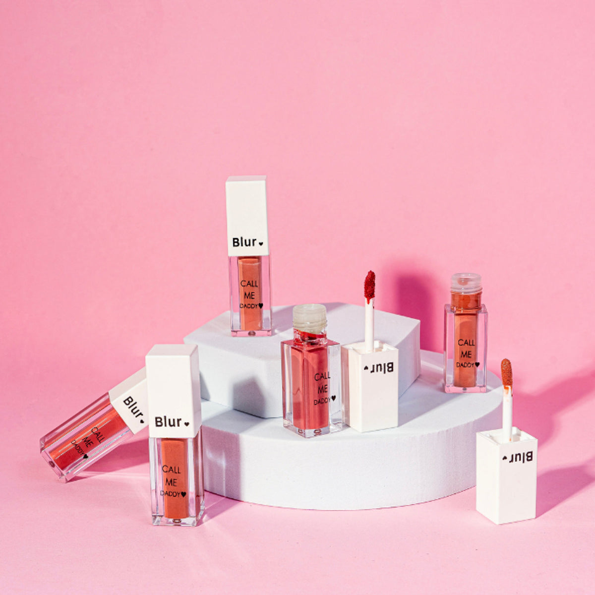BLUR INDIA Call Me Daddy Nude Matte Liquid Lipstick in Cherry Red, showing the sleek tube and vibrant red shade.