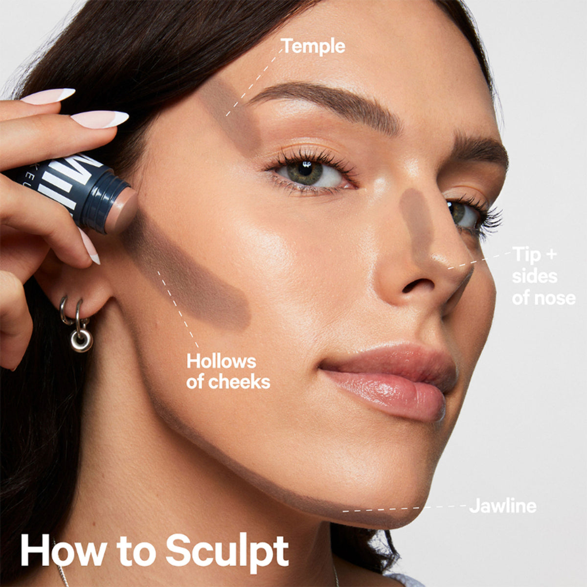 MILK MAKEUP Sculpt Stick in Smolder, a contour and highlighting stick with a portable design and natural finish.