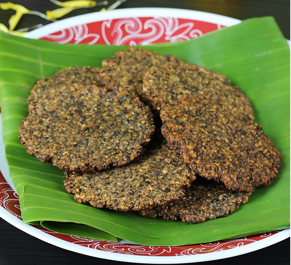 Godavari Vantillu Tirupati Style Minapa Vada, crispy South Indian snack, served on a traditional plate with chutneys.