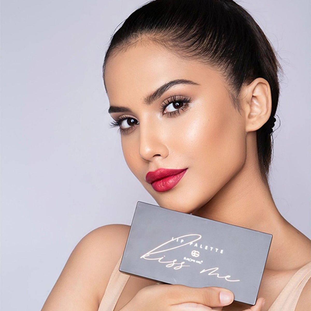Europe Girl Kiss Me Lip Palette featuring a colorful array of lip shades in a sleek compact for versatile makeup looks.