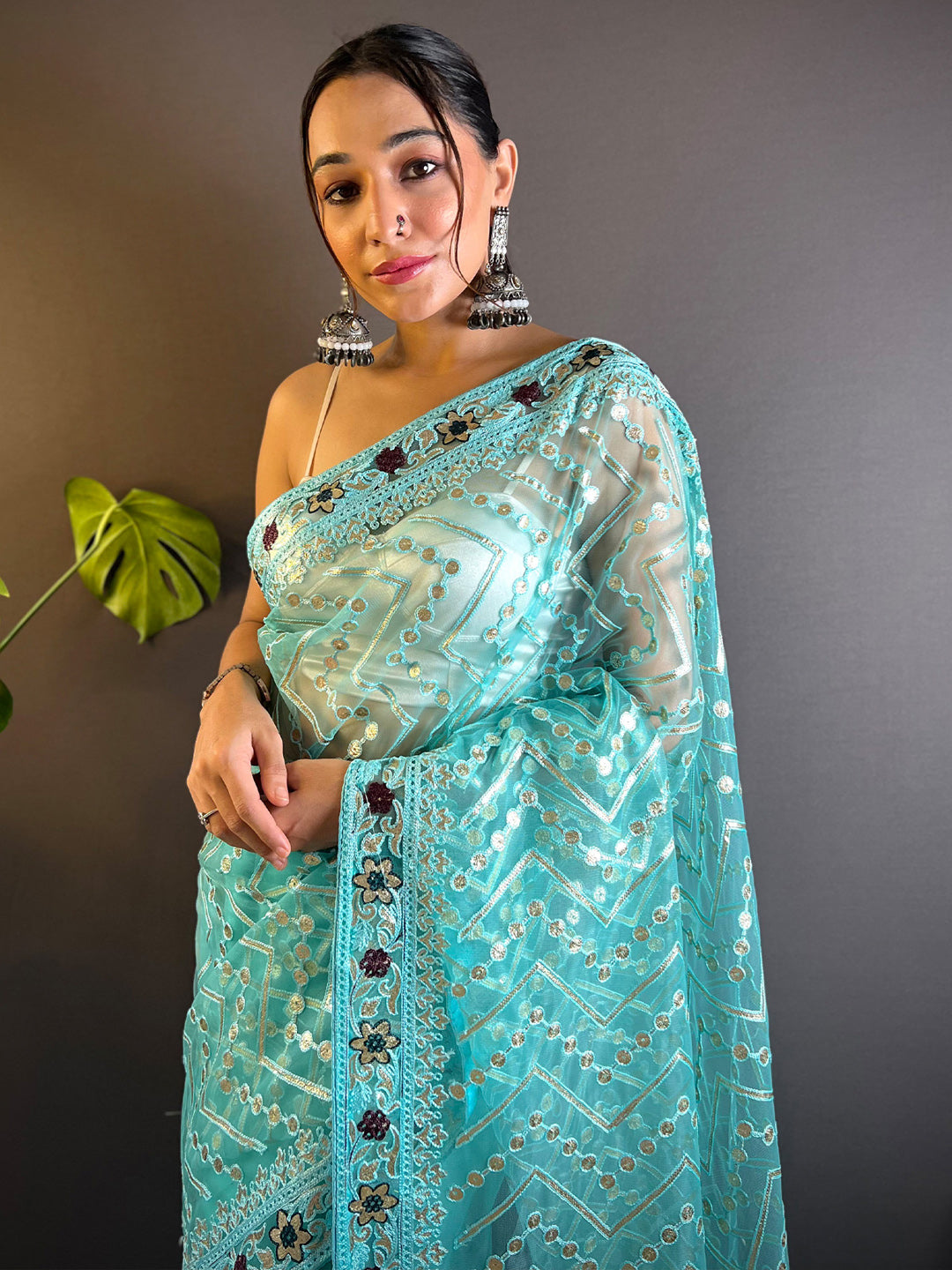 Women's Net Light Blue Embellished Designer Saree With Blouse Piece