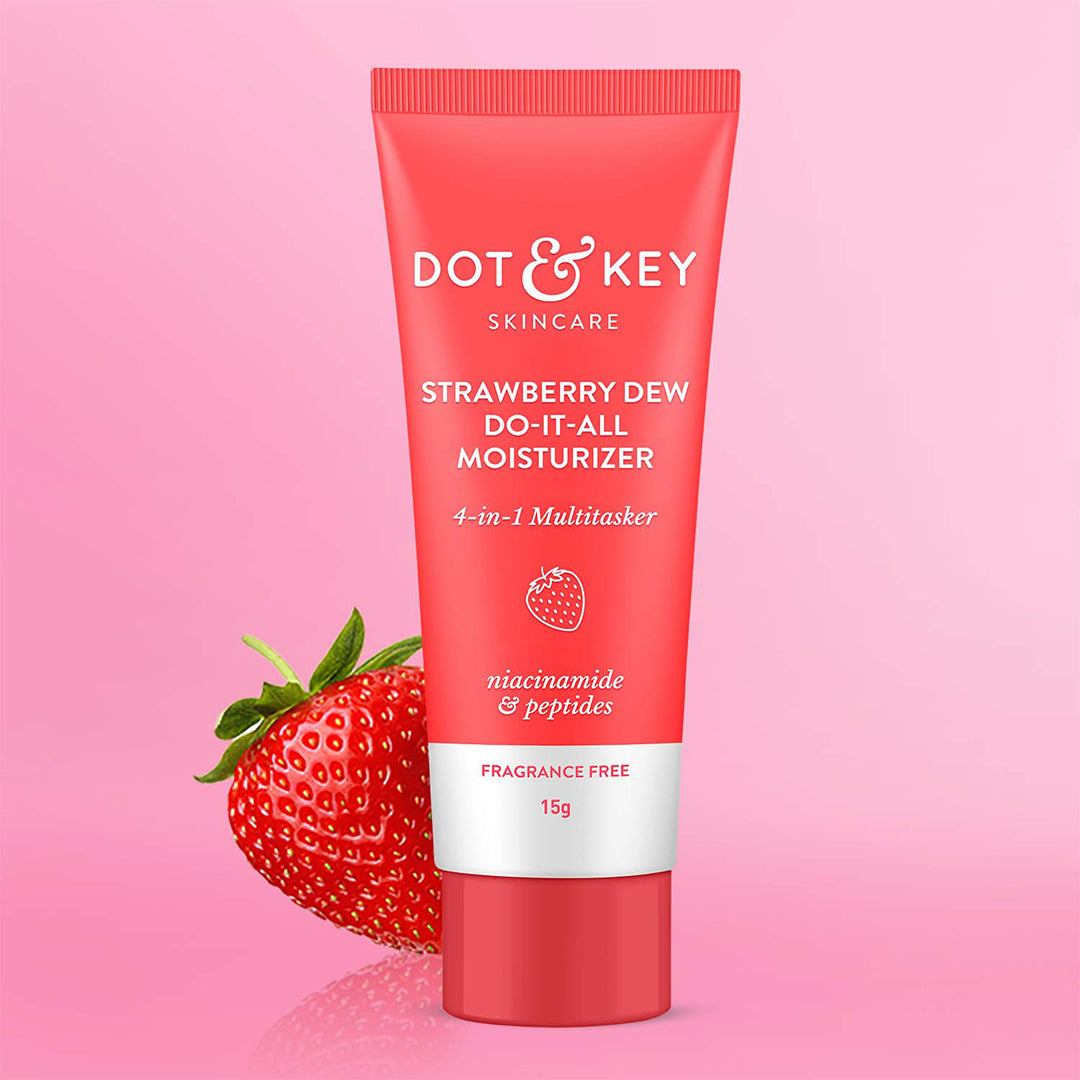 Dot & Key Strawberry Moisturizer 15ml skin care product in a clear jar with a pink label and fresh strawberry imagery.