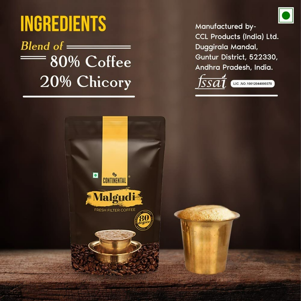 Container of Continental Malgudi Filter Coffee Powder showing the product label and coffee powder inside a glass jar.
