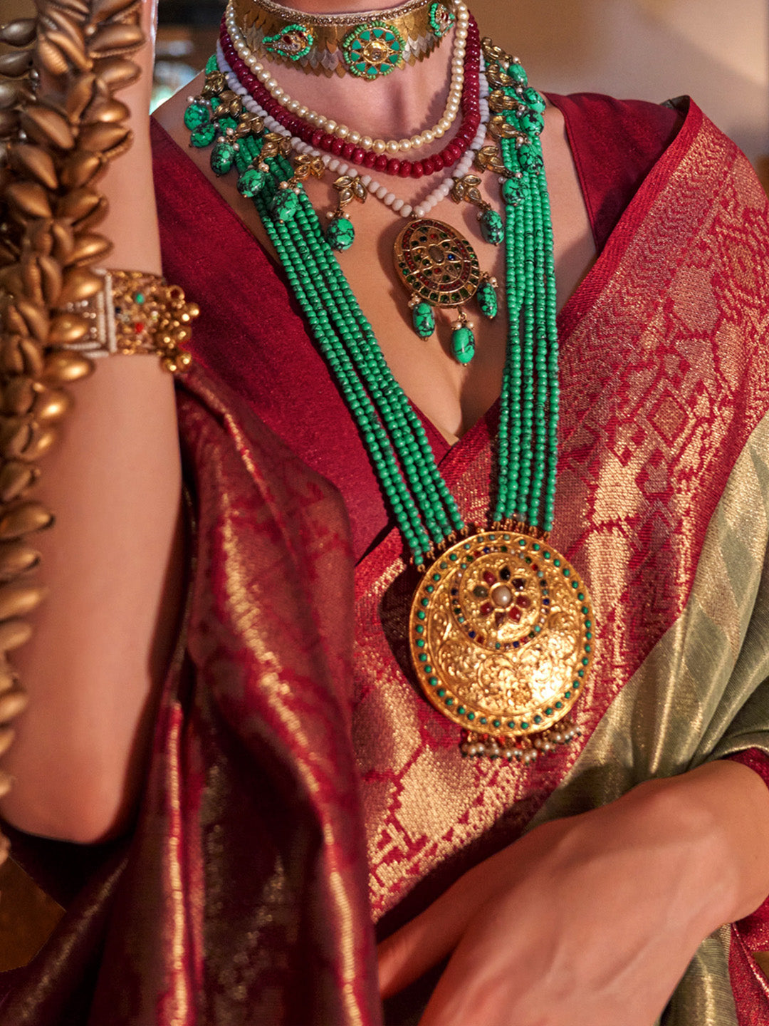 Women's Tissue Maroon Woven Design Designer Saree With Blouse Piece
