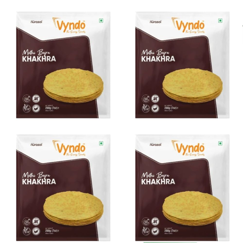 Vyndo Methi Bajra Khakhra, North Indian snack with crispy, seasoned bajra and methi, served in a clear plastic package.