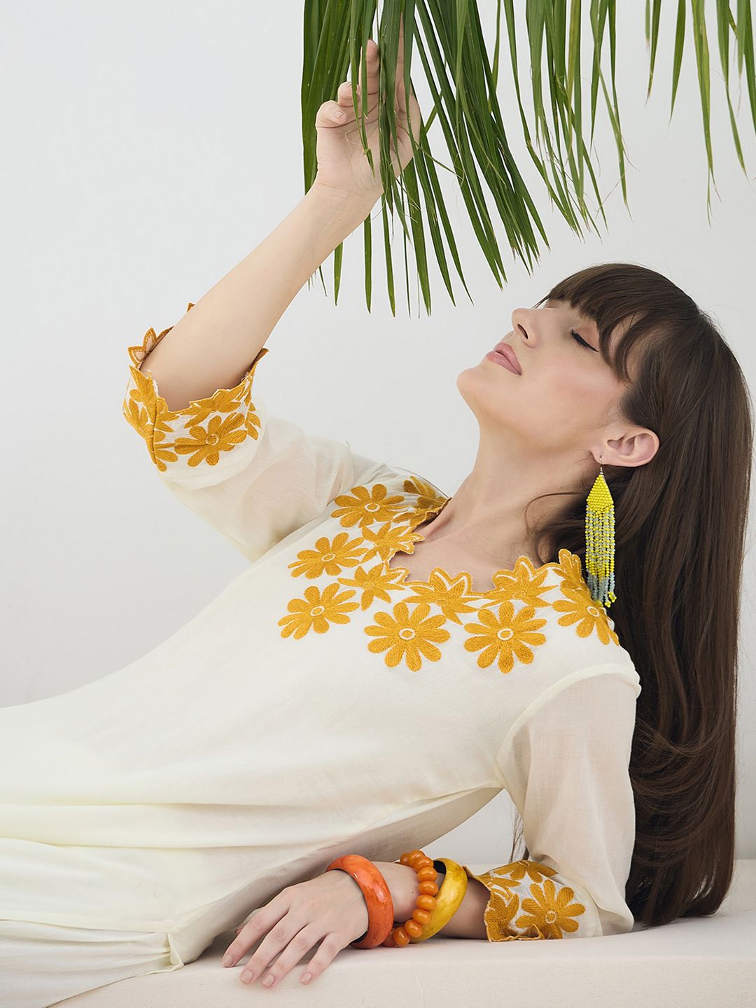 Women Floral Embroidered Cotton Kurta with Trousers