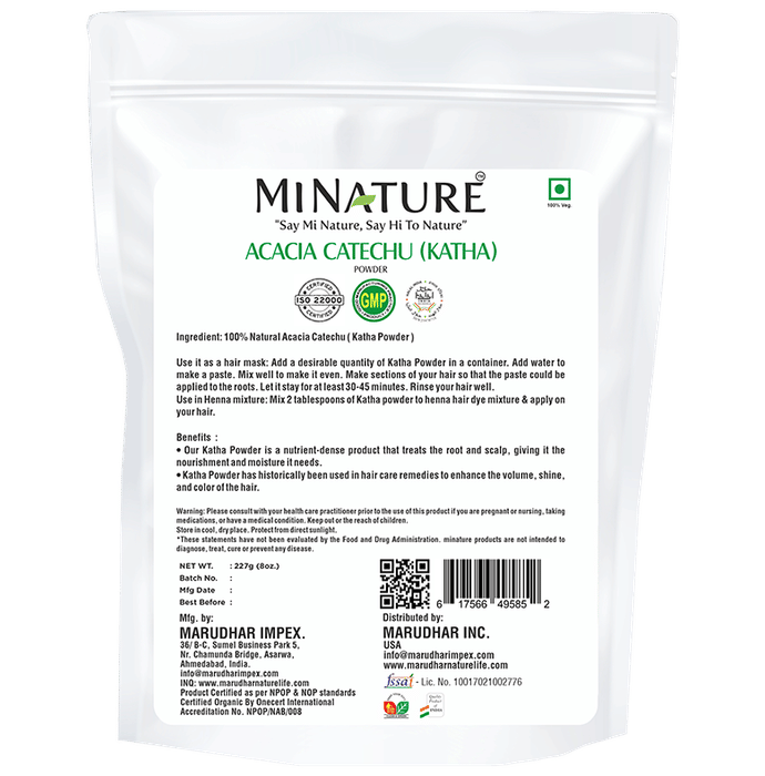 Minature Acacia Catechu (Katha) powder for hair masks, finely ground herbal powder in a clear container with a white background.
