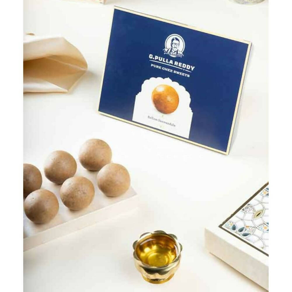 G Pulla Reddy Bellam Sunnundalu, North Indian sweet with sesame and jaggery in a traditional presentation