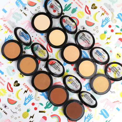 Rude Cosmetics Stop The Pressed Powder in Cool Beige 07 with compact case and open pressed powder visible.