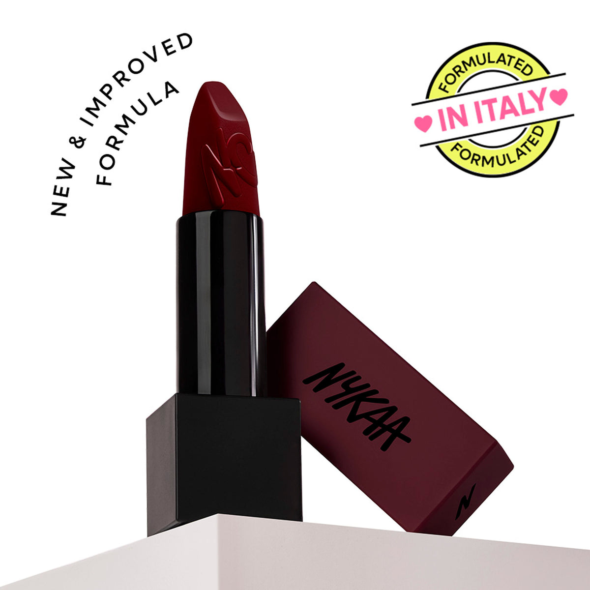 Nykaa Ultra Matte Lipstick in Meryl shade, featuring a sleek tube with the rich, deep pink color visible in the image