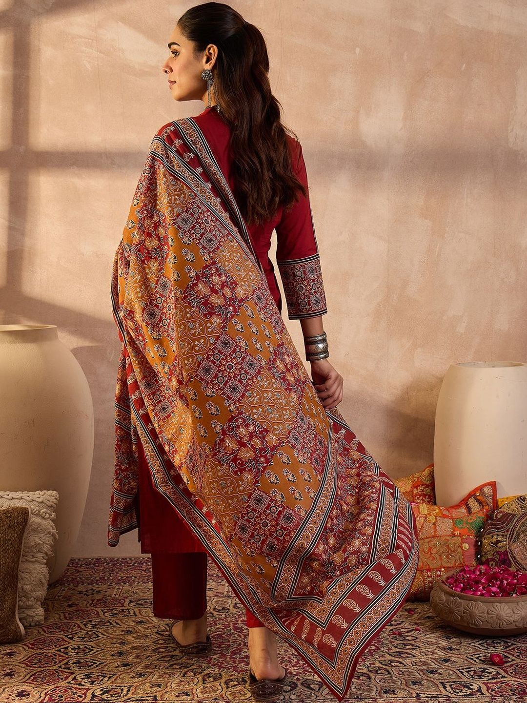 Women Ethnic Motifs Embroidered Cotton Kurta with Trousers