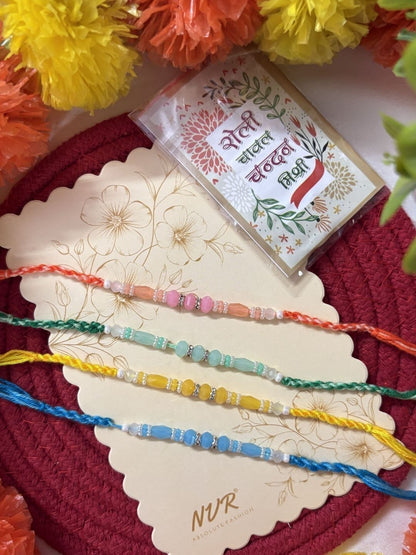 Anouk Set Of 4 Multicolor Artificial Beads Thread Rakhi With Roli Chawal Chandan Mishri