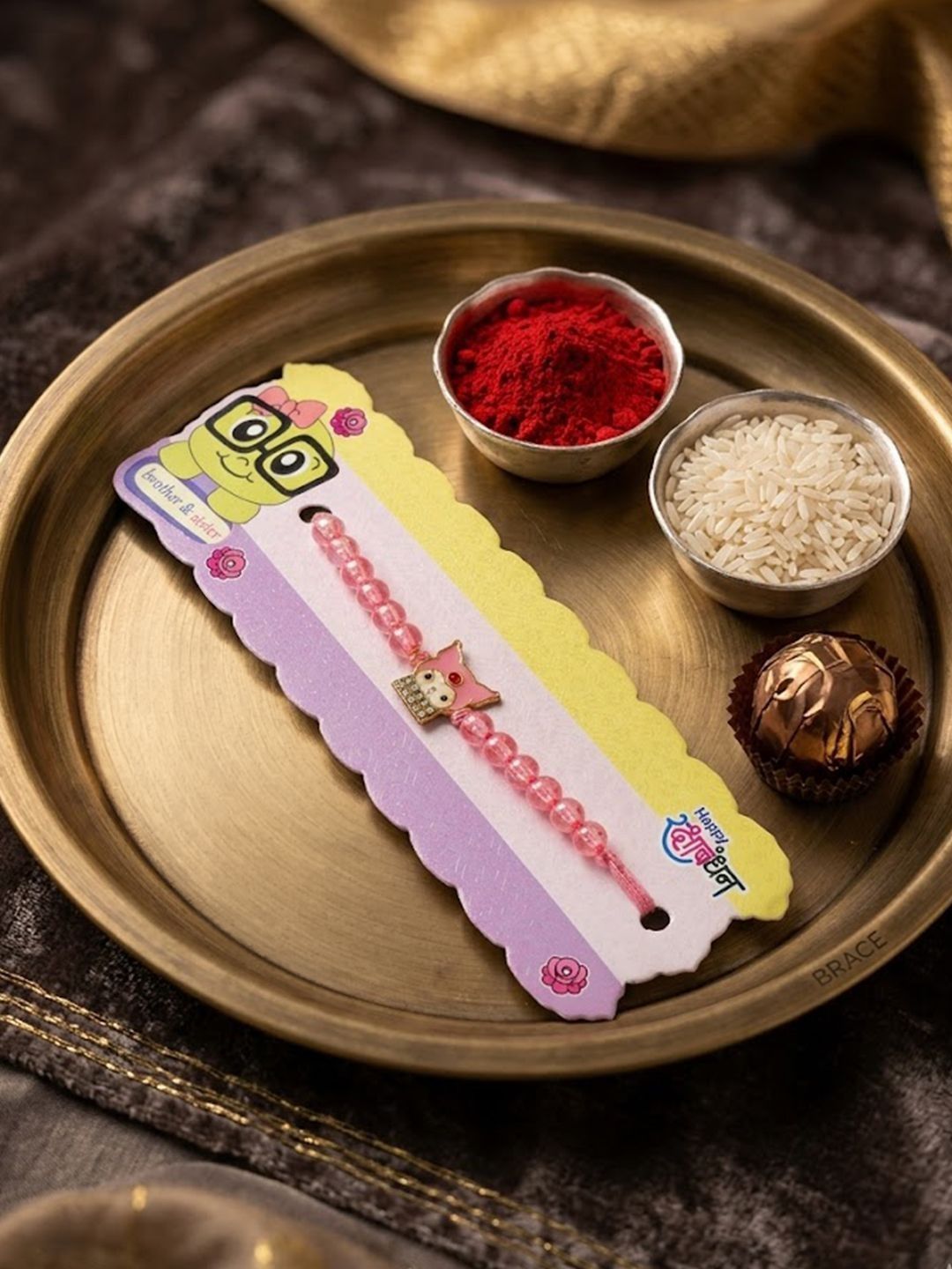 Anouk Pink Transparent Beaded Cartoon Character Kids Rakhi With Roli Chawal Chandan Mishri