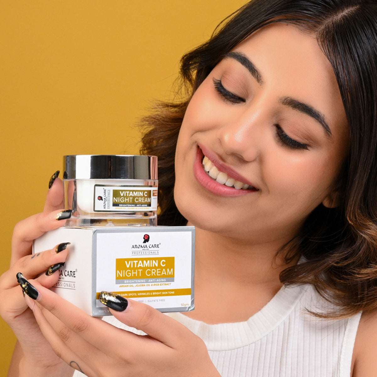 Aroma Care Vitamin C Night Cream with jojoba, argan, and almond oils for skin nourishment and replenishment.