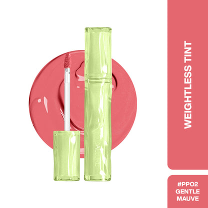 Focallure Color Lasting Lip Tint PP02 swatched on hand, vibrant coral shade, smooth texture, and glossy finish.