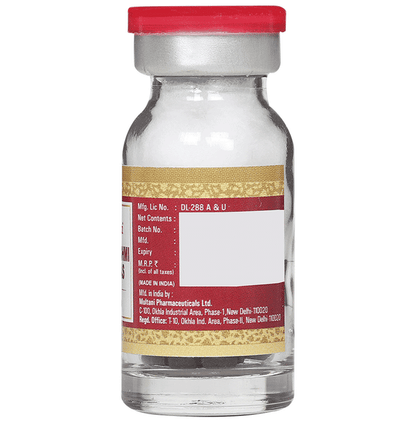 Multani Mahalaxmi Vilas Ras Ayurvedic tablets with gold, traditional herbal medicine in a glass container.