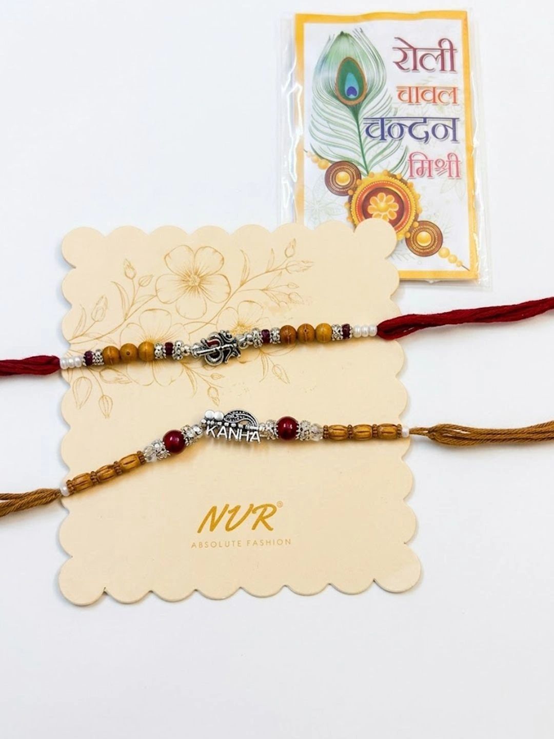 Anouk Set Of 2 Silver Toned Religious Rakhi Thread Rakhi Roli Chawal Chandan Mishri