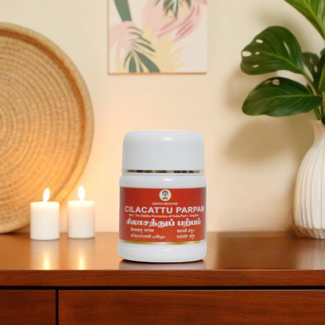 Impcops Silasath Parpam Ayurvedic medicine in a glass jar with herbal ingredients visible inside, used for traditional health benefits.