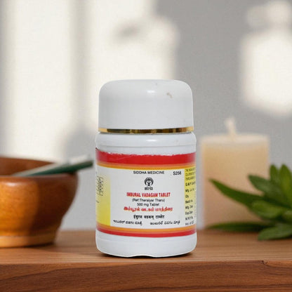 Impcops Impooral Vadagam Ayurvedic tablets in a bottle, showing the supplement packaging and tablets inside.