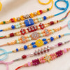 Dhiyona Set Of 7 Multicolor Designer Thread Rakhi With Roli Chawal Chandan Mishri