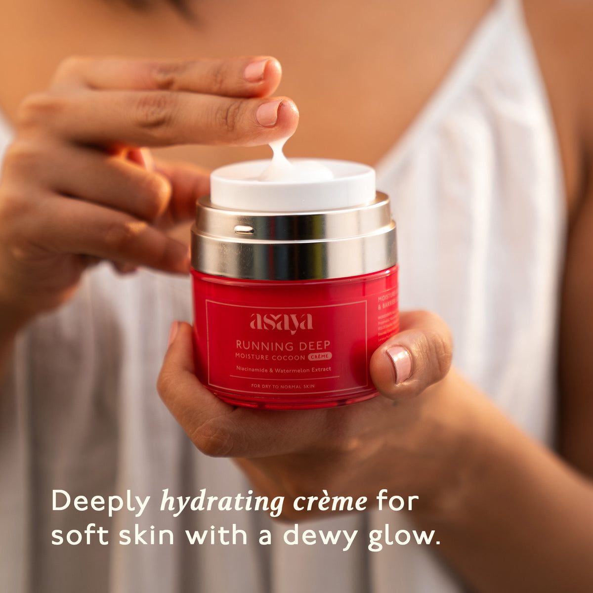 Asaya cream face moisturizer for dry skin with niacinamide, watermelon extract, and glycerine, shown in a jar with fresh watermelon slices