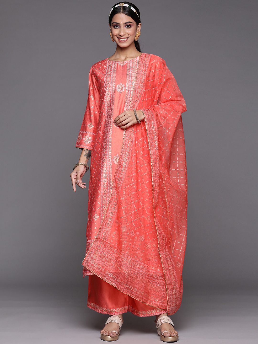 Indyancart IE Women Orange Ethnic Motifs Printed Liva Kurta with Trousers & With Dupatta