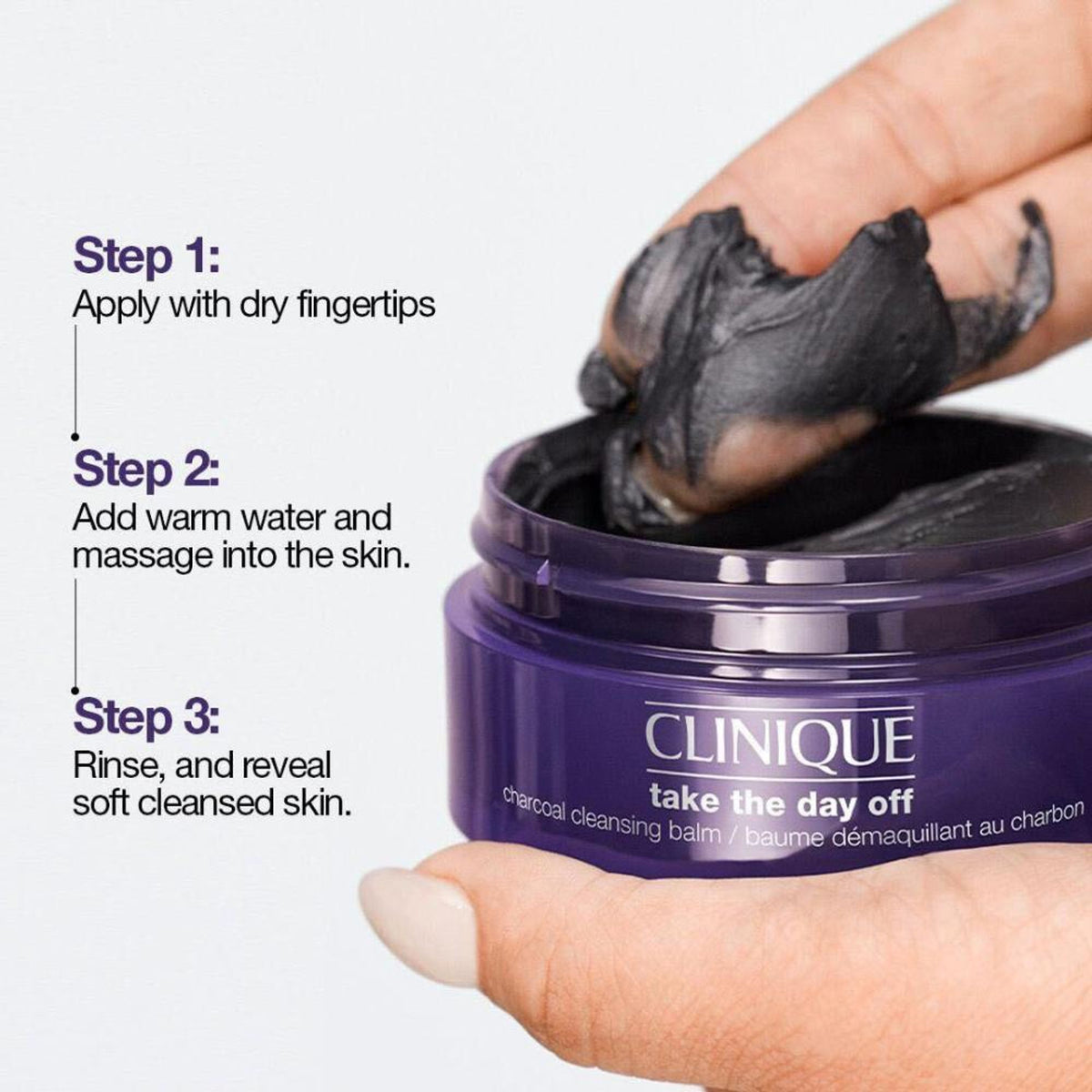 Clinique Take The Day Off Charcoal Balm with black balm texture for makeup removal and skincare cleansing.