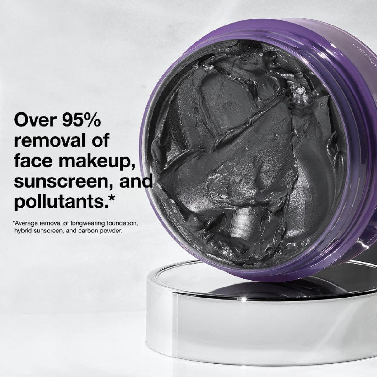 Clinique Take The Day Off Charcoal Balm in a sleek jar, showing the black balm inside for makeup removal and deep cleansing.