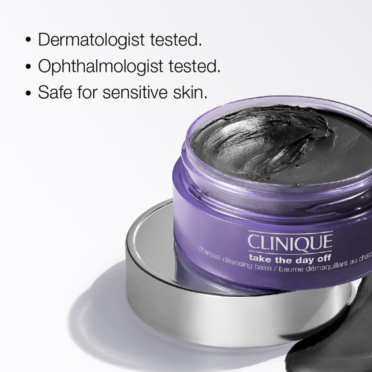Clinique Take The Day Off Charcoal Balm in a sleek jar, showcasing the black, charcoal-infused cleansing balm for makeup removal.