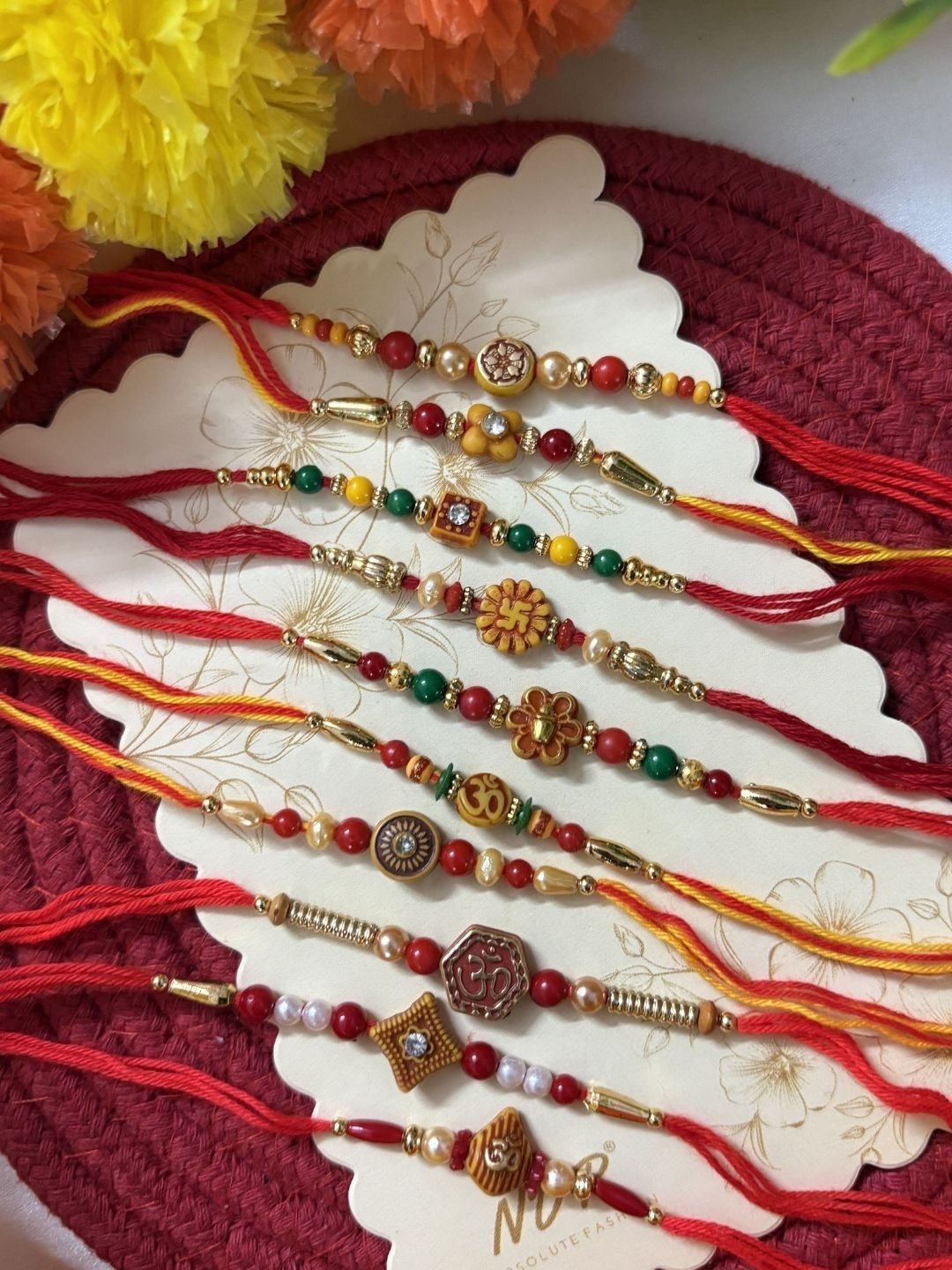 Anouk Set Of 10 Multicolor Designer Thread Rakhi With Roli Chawal Chandan Mishri