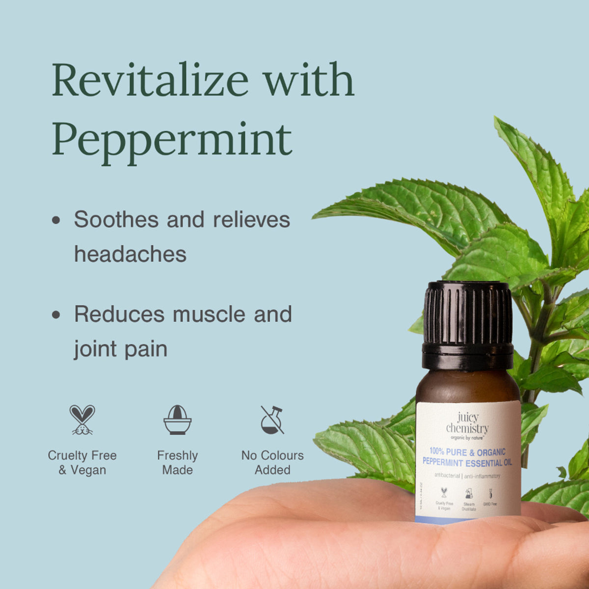 Juicy Chemistry pure organic peppermint essential oil bottle with dropper cap, showing the clear glass container and label.