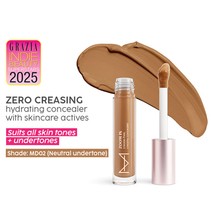 House of Makeup Zoom In creamy concealer in MD02 medium to deep skin tone, showing smooth, blended application on skin.