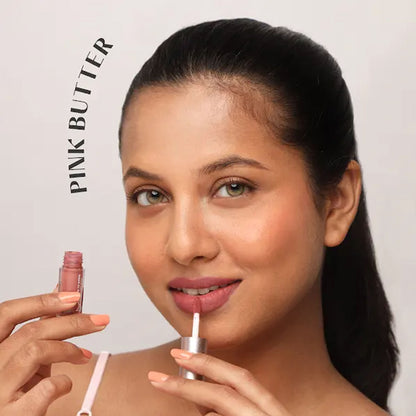 House of Makeup Dawn to Dawn MINI Liquid Matte Lipstick in Pink Butter, showcasing the lipstick tube and swatch in a natural setting.
