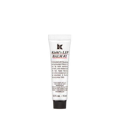 Kiehl's Lip Balm in a small jar, moisturizing and protecting dry lips with nourishing formula.
