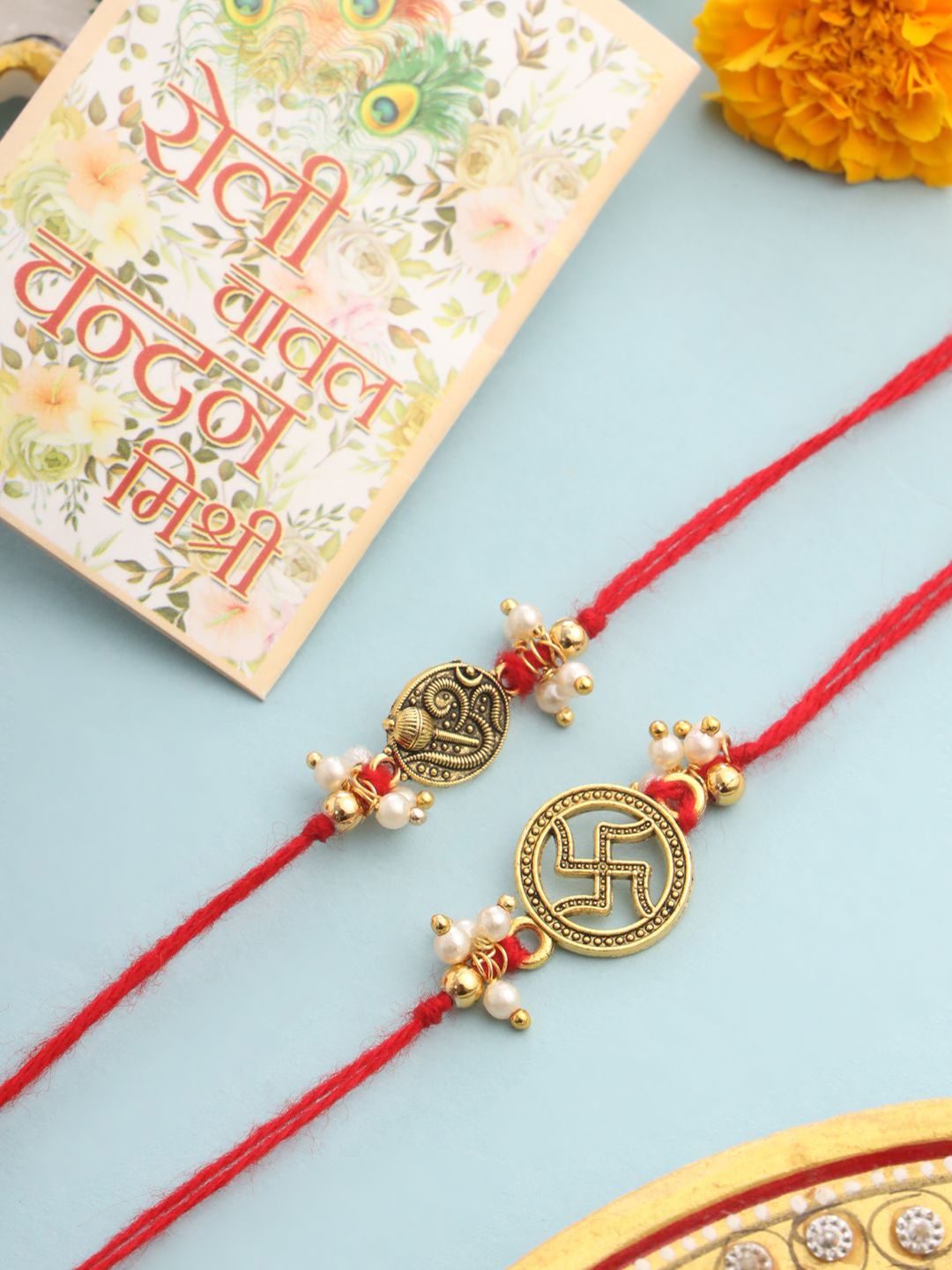 Anouk Pack Of 2 Swastik Desgin Bhaiya Bhabhi Rakhi With Roli Chawal Chandan Mishri