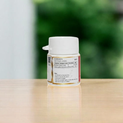 Impcops Padikara Parpam Ayurvedic herbal powder in a glass jar with label and traditional packaging.