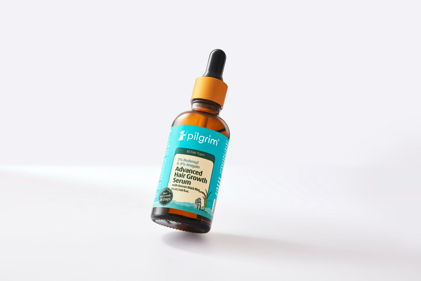 Pilgrim hair growth serum with Redensyl, Anagain, and Korean black rice in a sleek dropper bottle, designed to promote hair health.