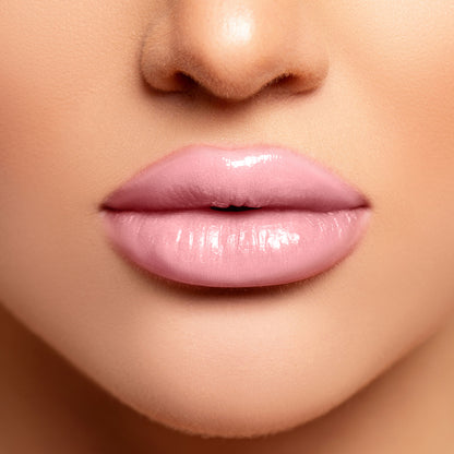 Colors Queen Lips Color Lip Balm tube with vibrant pink and red shades displayed, showcasing the colorful lip balm product.