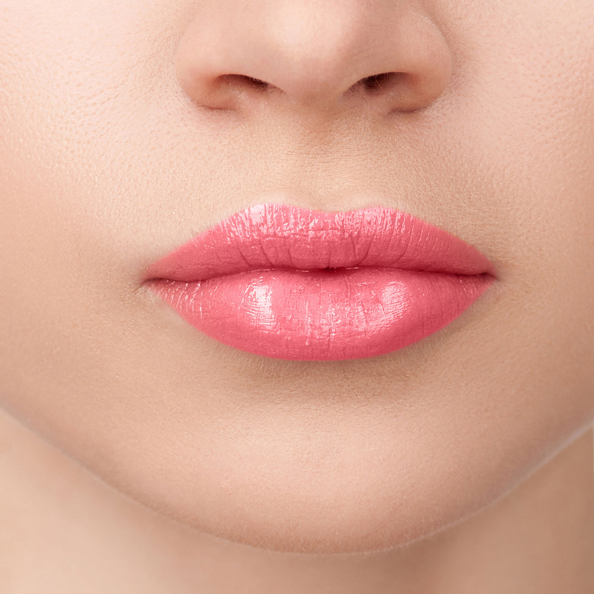 Colors Queen Lips Color Lip Balm tube with vibrant pink and red shades, showcasing the colorful lip balm product.