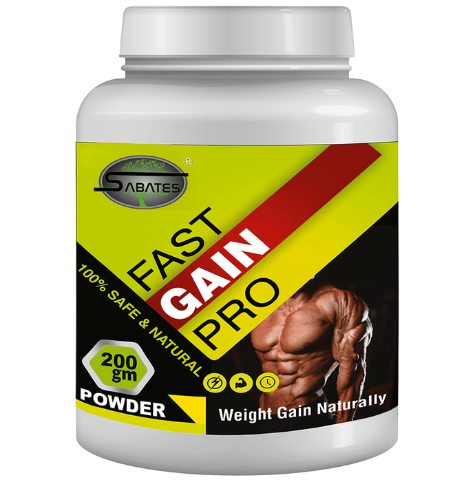Sabates Fast Gain Pro Powder health drink in a glass, showing the powdered supplement with a spoon, ready to be mixed.