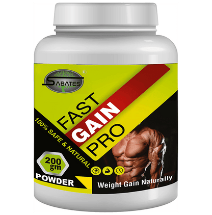 Sabates Fast Gain Pro Powder health drink in a glass, showing the powdered supplement with a spoon, ready to be mixed.