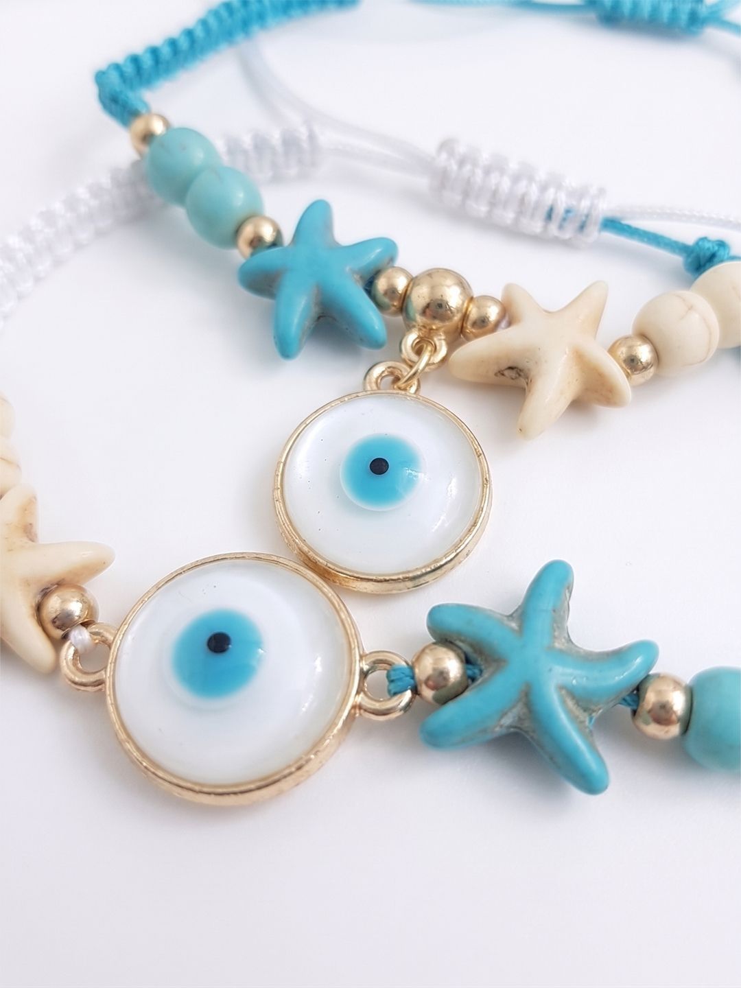 Anouk Set Of 2 Blue Evil Eye & White Pearl Bhaiya Bhabhi Rakhi With Roli Chawal Chandan