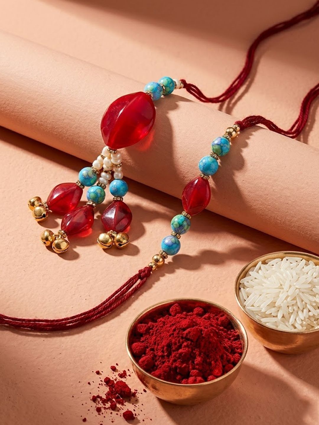 Anouk Set Of 2 Artificial Beads & Gold Toned Ghungroo Bhaiya Bhabhi Rakhi With Roli Chawal