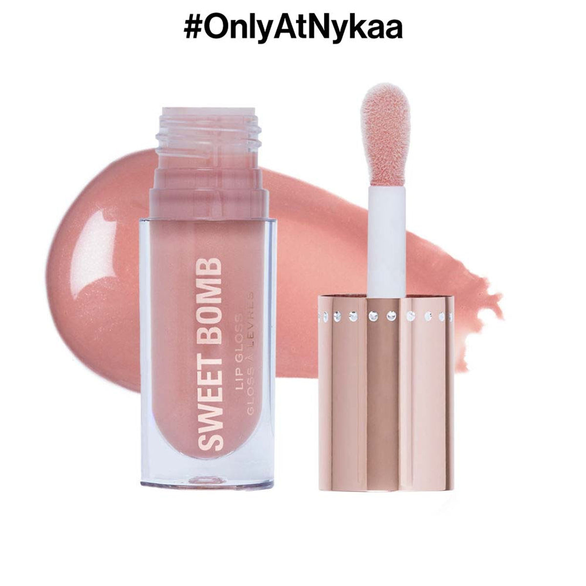 Makeup Revolution Y2K Baby Sweet Bomb Lip Gloss in Strawberry Swirl Nude, glossy lip product with pink and nude tones.