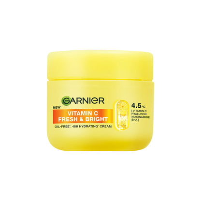 Garnier Fresh & Bright Vitamin C Sorbet moisturizer with hyaluronic acid and niacinamide, shown in a jar with bright packaging.