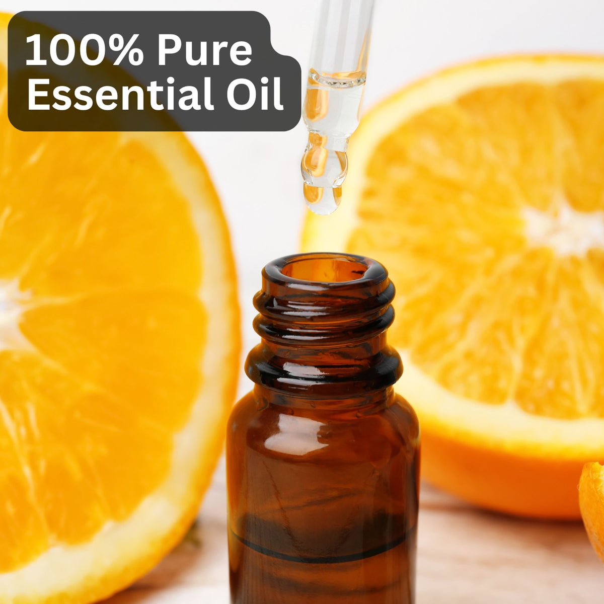 Bottle of Aroma Treasures Orange Essential Oil with a bright orange color and natural citrus scent, presented in a clear glass bottle.